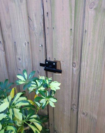 A securely closed gate latch